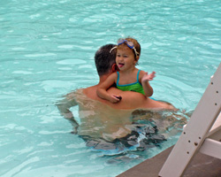 Child in Pool with Parent