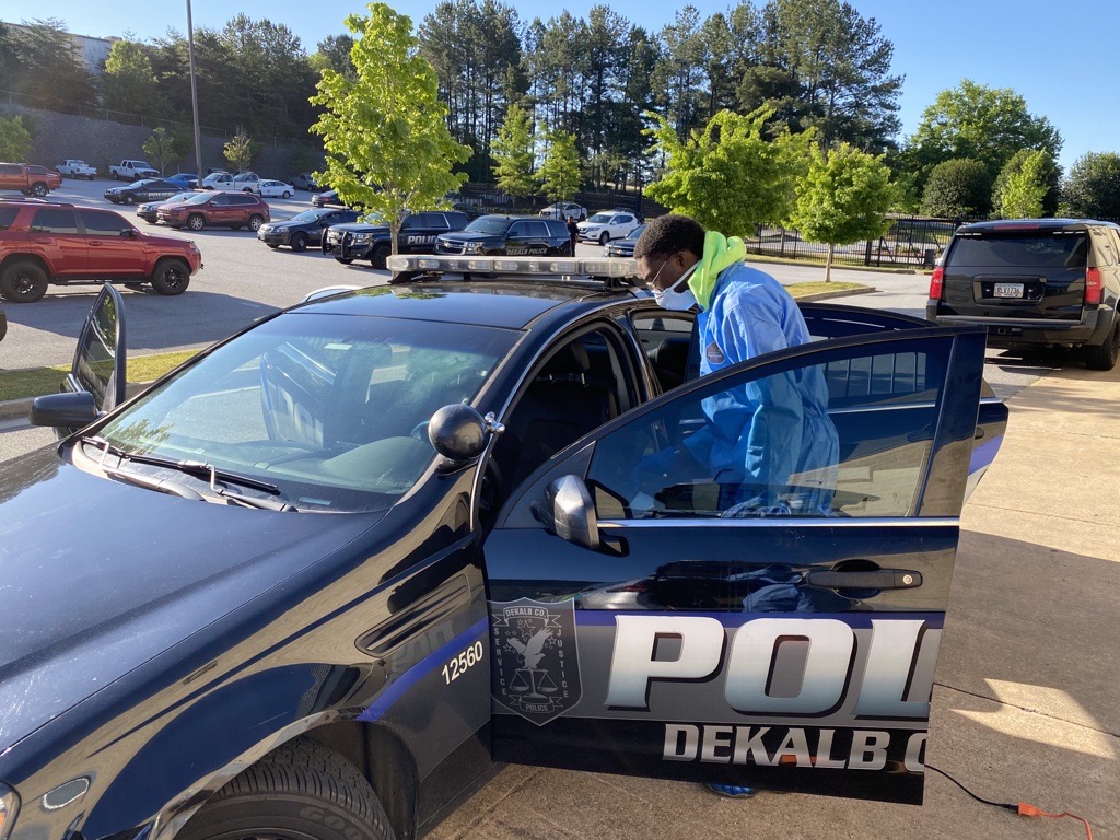 DeKalb County Police vehicles are cleaned.
