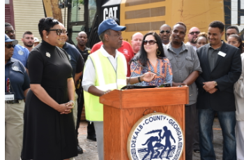 DeKalb CEO Michael Thurmond, Commissioner Lorraine Cochran-Johnson, Commissioner Nancy Jester, county staff and residents at Brannon Hill demolition.