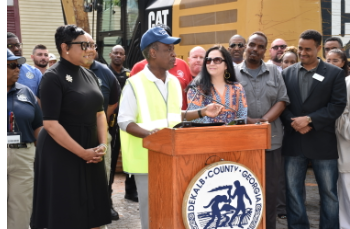 DeKalb CEO Michael Thurmond, Commissioner Lorraine Cochran-Johnson,  Commissioner Nancy Jester, county staff and residents  at Brannon Hill demolition. 