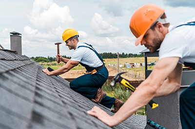 Contractors performing roof repair work