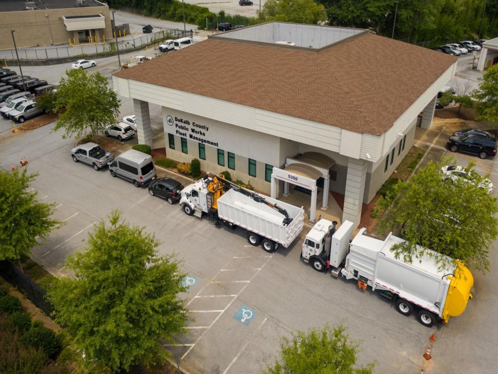 Fleet Administration Building with vehicles ranging from a light duty electric car to a heavy duty refuse truck